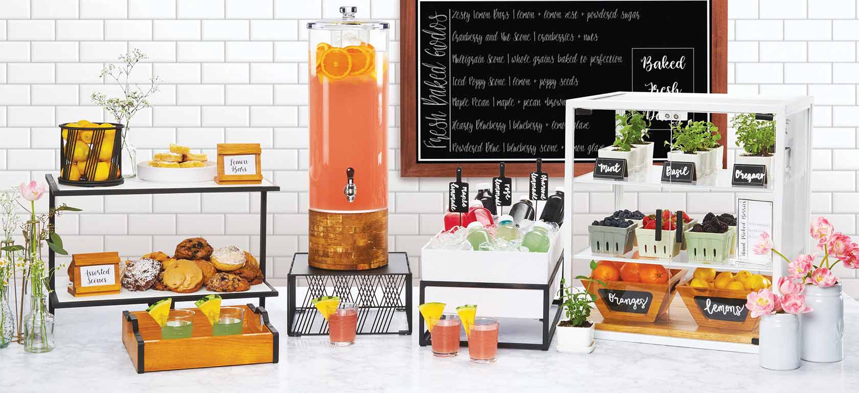 Lemonade and natural beverage display on a clean counter.