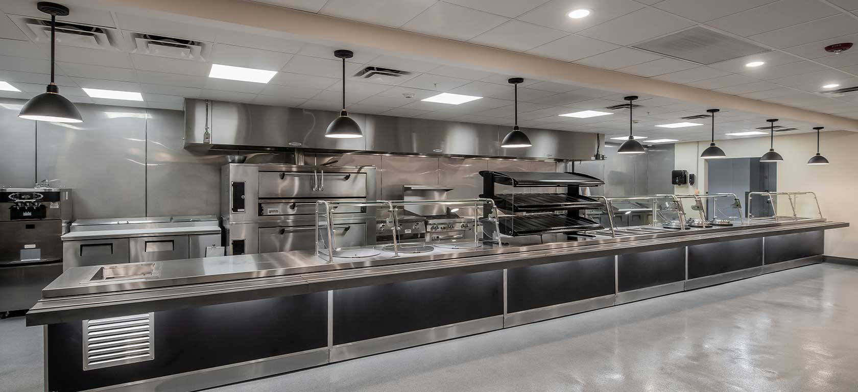 Black steel food display for a cafeteria.